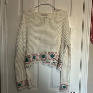 Cozy White Sweater with Colorful Accents